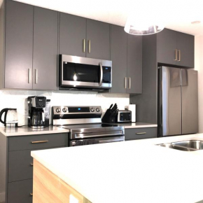Brand New 2BR Condo with Outdoor Swimming Pool and Hot Tub